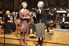 Lois Mastellar receving award on behalf of Bob at Dvorack Concert