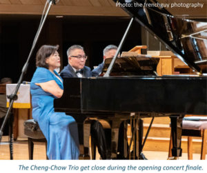 The Cheng-Chow Trio get close during the opening concert finale.